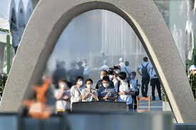 The hiroshima peace memorial park is located atop the busy commercial district obliterated by the atomic blast and contains monuments dedicated to the thousands killed in the explosions. 0og3prr8zemsam