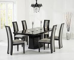 Dual purpose furniture demonstration of the expand table & nano chair set. Black Marble Dining Table With 8 Chairs Homegenies