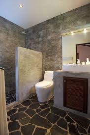 Konsep kamar mandi dengan warna yang cukup gelap, tetapi terdapat pencahayaan yang bagus. Contoh Foto Desain Kamar Mandi Hotel Armani Dubai Terbaru 2013 2014 Efrata Desain Kontraktor Interior Arsitek Arsitektur Semarang