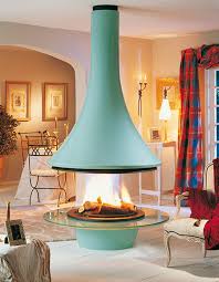 Freestanding fireplace raised on legs or stand. Ceiling Hanging Fireplace Eva From Bordelet Bold And Beautiful Central Chimney