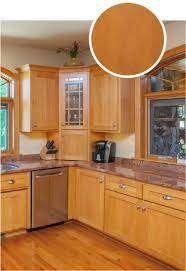 Mid brown maple cabinets create a neutral visual background for dark brown maple kitchen island and matching backless stools with woven seats. Maple Kitchen Cabinets All You Need To Know