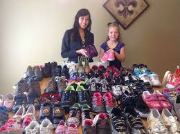 7 year old collects shoes for those in need