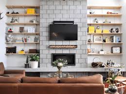 The wall is plaster and although i was hoping to find a stud, it looks like the brick of the fireplace extends only up to the height of the mantle and from. Tips For Hanging A Flat Screen Tv Over A Fireplace Apartment Therapy