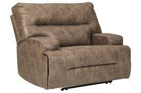 The hogan oversized recliner by ashley furniture signature design not only looks the most inviting chair on the planet but it must surely be one of the widest single recliners available. Hazenburg Oversized Manual Recliner Ashley Furniture Homestore