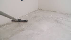 clean a dusty concrete basement floor