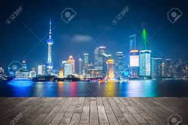 Shanghai Skyline At Night Light Show With Wooden Floor Prospect