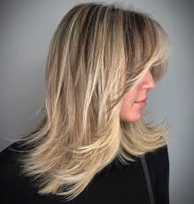 This hairstyle works well for short hair because the ponytail is low in the back and therefore you won't have to take a small section of the hair at the front of the face on your left side, and start twisting how to curl short/medium hair with a straightener. 50 Best Styles For Medium Length Hair With Bangs Hair Adviser