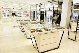 Selection Of Designer Eyewear And Sunglasses In An Optician Store
