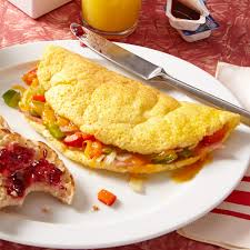 Cook the omelet just until the egg is cooked through, but not browned or crispy on the bottom. How To Make An Easy Omelet Rachael Ray In Season