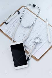 Mobile Phone Stethoscope And Chart File On The Desktop Mobile