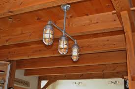 Rustic Industrial Lighting Gives Nod To Steampunk Nautical Inspiration Barn Light Electric