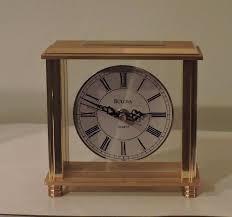 Bulova treasure chest clock executive desk shelf mantel wood brass accents. Bulova B1703 Cheryl Brass Table Clock And Similar Items