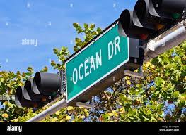 Ocean Drive street sign with traffic ...