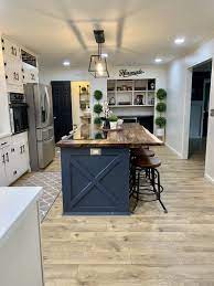 Butcher block kitchen island is a single table which had the shape similar to block, used for preparing the typically meat. Modern Farmhouse Kitchen With Butcher Block Island Kitchen Island With Stove Farmhouse Kitchen Design Farmhouse Kitchen Remodel