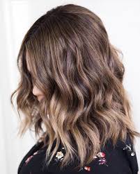 With a buttery blonde balayage applied liberally over darker blonde hair, this hairstyle strikes the perfect balance between trendy and natural looking. Mousy Brown Hair Is Having A Momentaso Brunettes Everywhere Can Finally Take A Break Southern Living