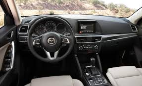 Different colors are used above and below the instrument panel to emphasize. 2016 Mazda Cx 5 Changes And Price Mazda Cars Mazda Suv Mazda