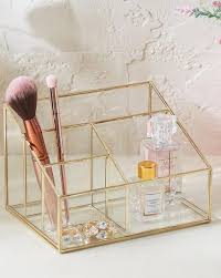 gold toned bathroom accessories for
