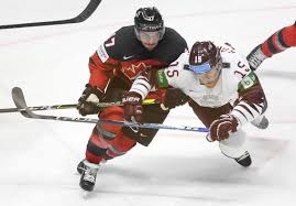 The name hockey probably derives from the french hocquet, or shepherd's crook, and refers to the crooked stick which is used to hit a small ball. Host Latvia Beats Canada 2 0 In World Hockey Opener