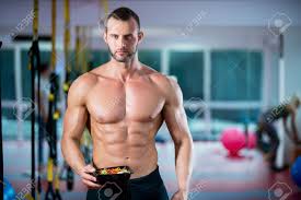 Eating Food Salad Bodybuilding Bodybuilder Fitness Gym Body Builder Building  Muscles Young Man Studio Stock Photo, Picture And Royalty Free Image. Image  91934684.