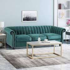 le house bowie velvet sofa in teal and dark brown