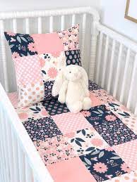 pink and blue baby bedding