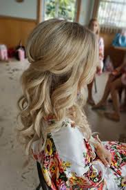 Embrace long, natural curls with a chic twisted half up half down hairstyle. 25 Bridesmaids Half Up Hairstyles That Inspire Weddingomania