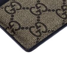 Check spelling or type a new query. Gucci Beige Black Gg Supreme Canvas Tiger Card Holder Gucci Tlc