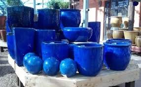 The former is a durable pot you can use year after year, while the latter is. Blue Pottery Jpg 372 229 Blue Planter Front Yard Landscaping Design Mid Century Landscaping
