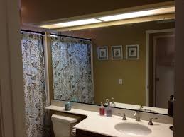 how to remove bathroom mirror with clips