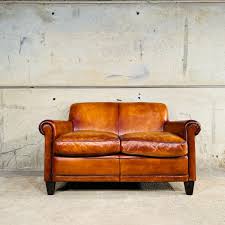 tan 2 seater leather sofa 833