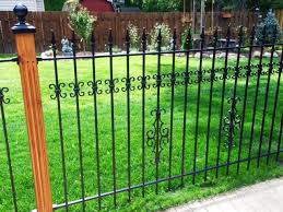 Wood Posts With Wrought Iron Fence