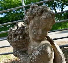 Weathered Classical Statues Of Children