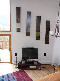 If you don't want to paint the whole wall like this, a large piece of artwork that uses dark colors on the bottom, and light ones on the top concept will also work. Beautiful Habitat Ask The Designer Vaulted Ceilings Decorating High Walls Vaulted Ceiling Decor Large Wall Decor