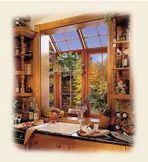 Anne's simple and beautiful diy greenhouse is made from old windows, and the box shape makes it easy to. Photo Of A Kitchen Wood Garden Window By Renaissance Conervatories Kitchen Window Design Window Greenhouse Kitchen Garden Window