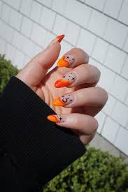 neon orange halloween nails