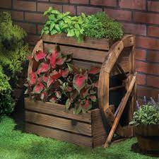 wood wagon wheel themed garden