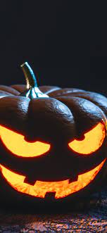 Two pumpkin lamps, Halloween, dark ...