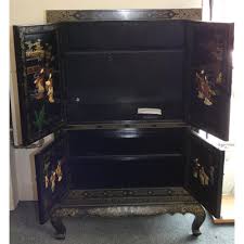 a chinese black lacquer cabinet the