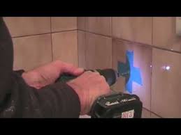 I need to drill through the concrete side wall of an external garage. How To Drill A Hole In A Tile Too Easy Youtube
