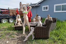 Man Sets Up Naked Mannequins in Yard After Complaints of High Fence