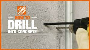 how to drill into concrete the home