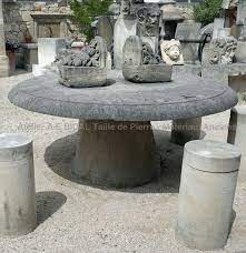 A Rustic Stone Table By Alain Bidal