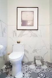 White Marble Bathroom With Gray Mosaic