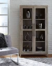 dalenville tall accent cabinet warm