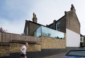 glass box extension by studio 304 sits