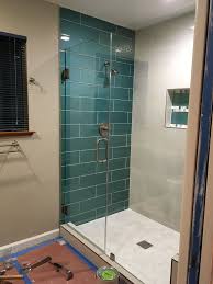 tile and frameless glass shower doors