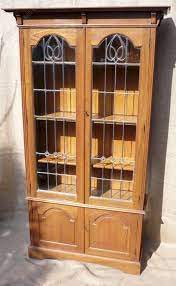 arts and crafts bookcase with leaded