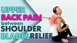 instant upper back pain between
