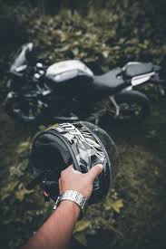 Download 4k wallpapers of black, dark, monochrome, black & white, amoled wallpapers in hd, qhd, 4k, 5k resolutions for desktop & mobile phones. Person Standing In Front Of Black And Red Sports Bike Photo Free Transportation Image On Unsplash