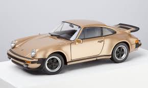 See our cpo inventory online today! Porsche 911 1975 930 Turbo Model Car 1 24 Scale Gold Porsche Exchange